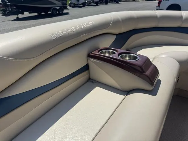Slide: The Image of Luxurious seating on a 2010 Bennington 2250RCW Pontoon with cup holders. - 34
