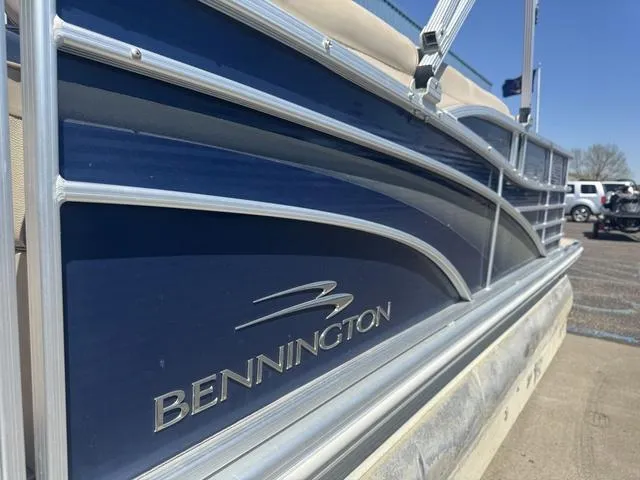 Slide: The Image of 2010 Bennington 2250RCW Pontoon boat, blue exterior, close-up view. - 4