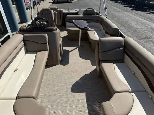 Slide: The Image of 2019 Bennington 21 SSX pontoon boat with spacious seating and modern interior design. - 36