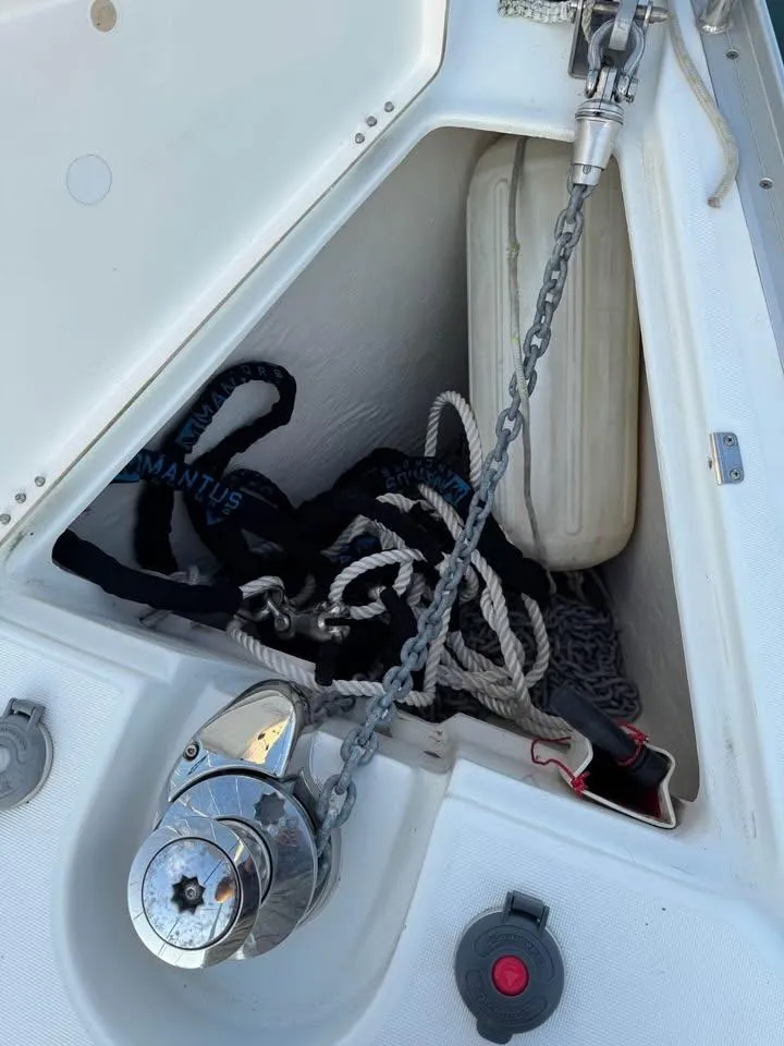 Slide: The Image of Anchor locker of 2008 Beneteau 343 sailboat with chain and ropes. - 17