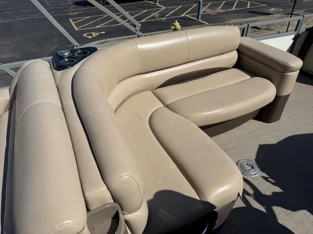 Slide: The Image of Luxurious beige seating on 2016 Regency 254 DL3 pontoon boat. - 12