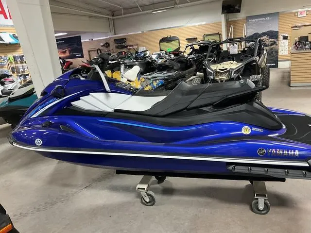 Slide: The Image of 2024 Yamaha Waverunner GP in showroom, vibrant blue color, sleek design. - 3