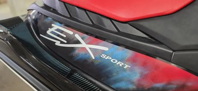 Slide: The Image of 2024 Yamaha Waverunner EX Sport, close-up of logo and design details. - 2