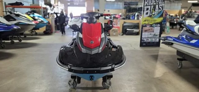 Slide: The Image of 2024 Yamaha Waverunner EX in showroom, front view, red and black design. - 9