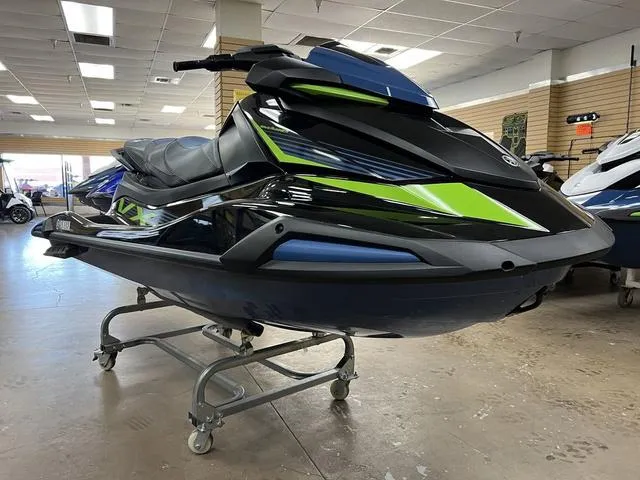 Slide: The Image of 2024 Yamaha Waverunner VX in showroom, featuring sleek design and vibrant green accents. - 4
