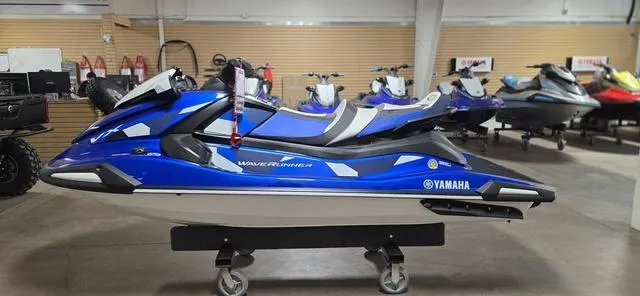 Slide: The Image of 2024 Yamaha Waverunner VX Cruiser HO with Audio, blue, displayed in showroom. - 7