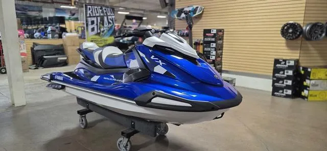 Slide: The Image of 2024 Yamaha Waverunner VX Cruiser HO with Audio, blue, displayed in showroom. - 8