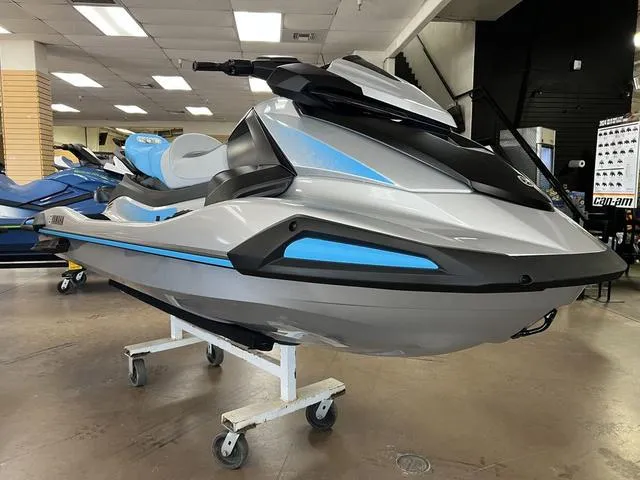 Slide: The Image of 2024 Yamaha Waverunner VX in showroom, sleek design with blue accents. - 3