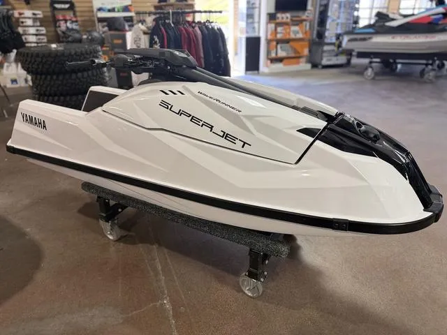 Slide: The Image of 2025 Yamaha Waverunners Superjet displayed in a showroom, showcasing sleek design and modern features. - 3