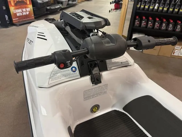 Slide: The Image of 2025 Yamaha Waverunner Superjet handlebars in a showroom setting. - 4