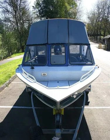 Slide: The Image of 2008 Fish Rite 20 Performer boat on trailer, parked outdoors. - 14