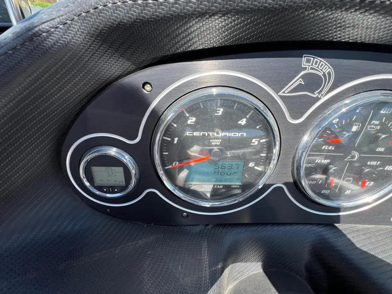 Slide: The Image of Dashboard of a 2016 Centurion Carbon Pro boat with gauges and controls. - 15