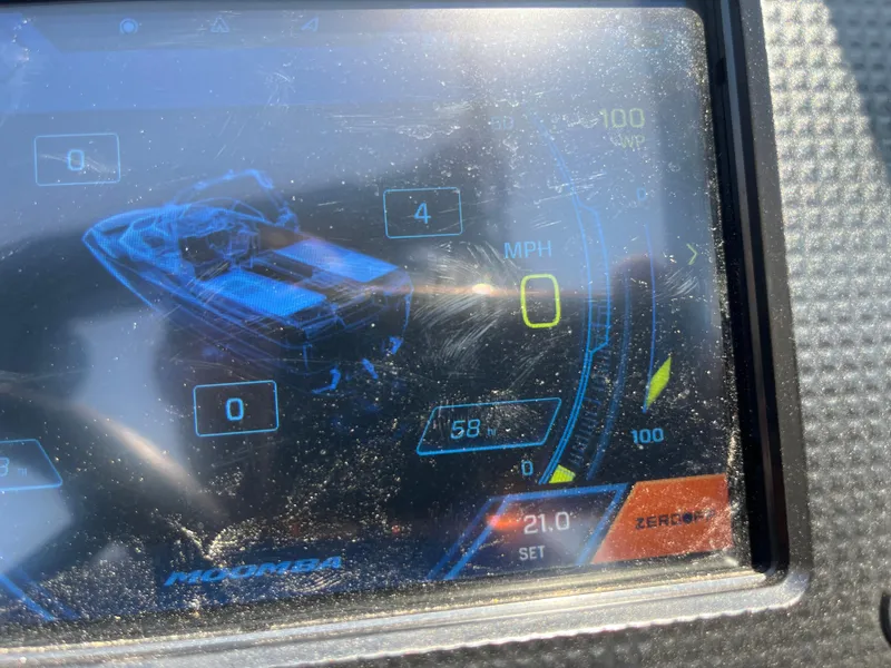 Slide: The Image of Dashboard display of a 2022 Moomba Makai boat showing speed and settings. - 23