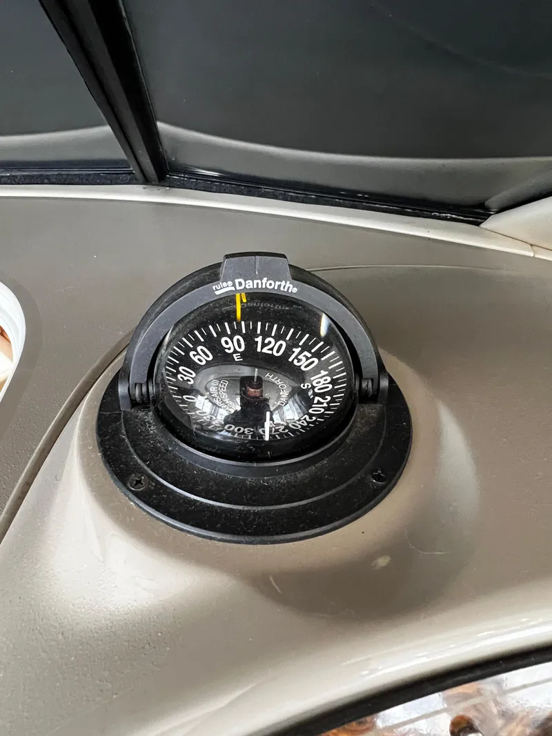 Slide: The Image of Compass on 2001 Bayliner 3488 Command Bridge Motoryacht dashboard. - 28
