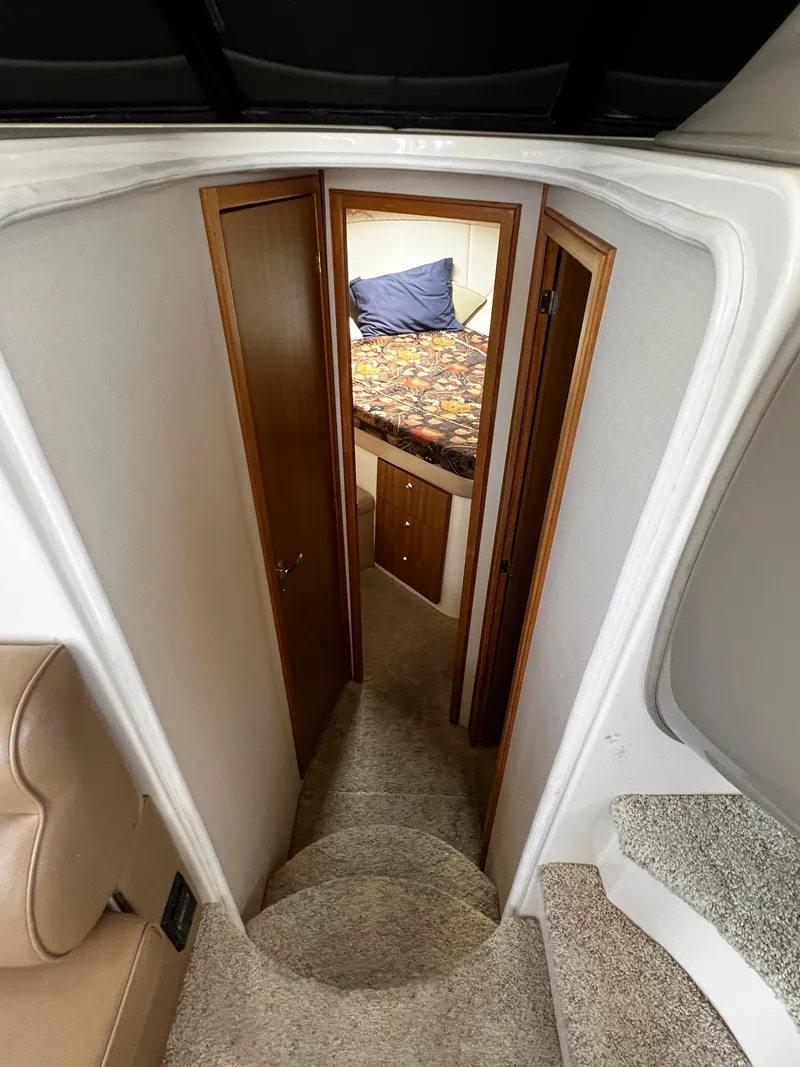 Slide: The Image of Interior view of 2001 Bayliner 3488 Command Bridge Motoryacht with cozy cabin and stairs. - 38