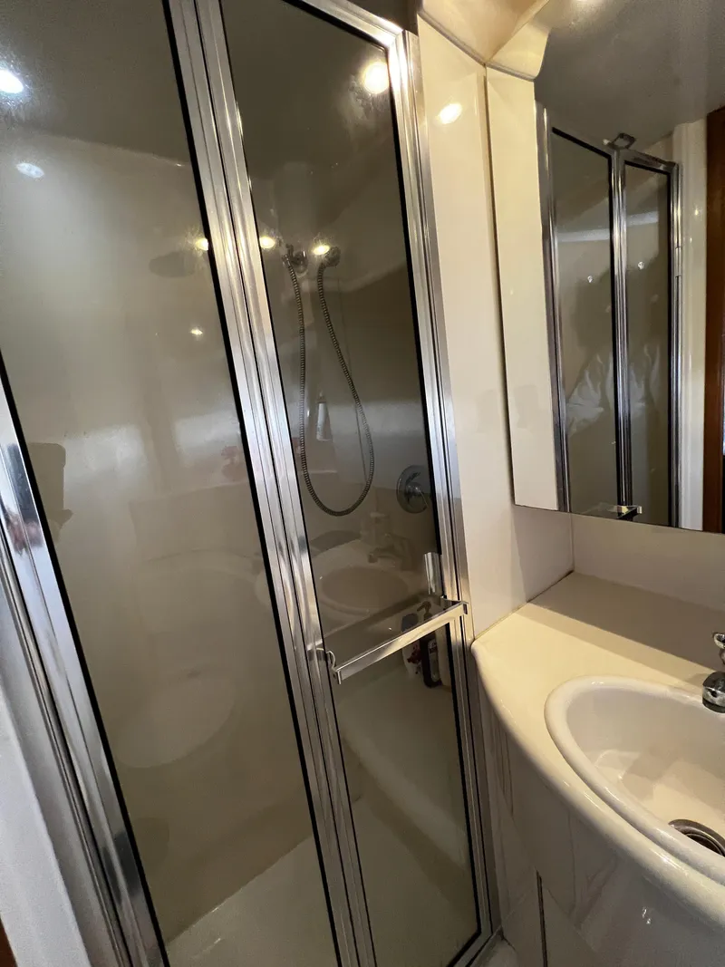Slide: The Image of Bathroom in 2001 Bayliner 3488 Command Bridge Motoryacht with shower and sink. - 45