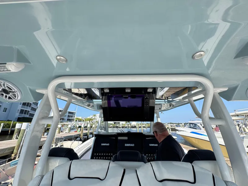 Slide: The Image of 2024 Tidewater 380 CC Adventure boat interior with advanced navigation systems. - 10