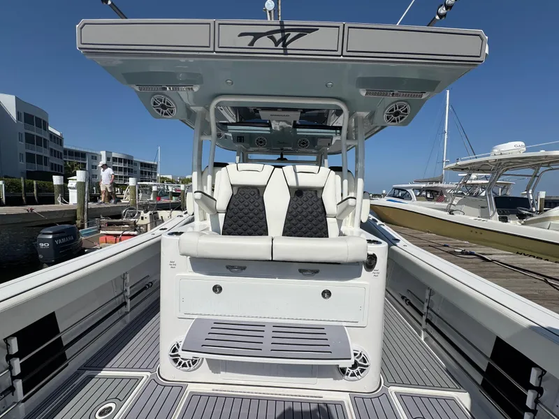 Slide: The Image of 2024 Tidewater 380 CC Adventure boat interior with seating and modern design. - 17
