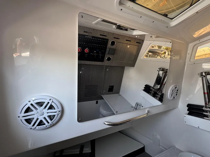 Slide: The Image of 2024 Tidewater 380 CC Adventure cabin interior with control panel and speaker. - 28