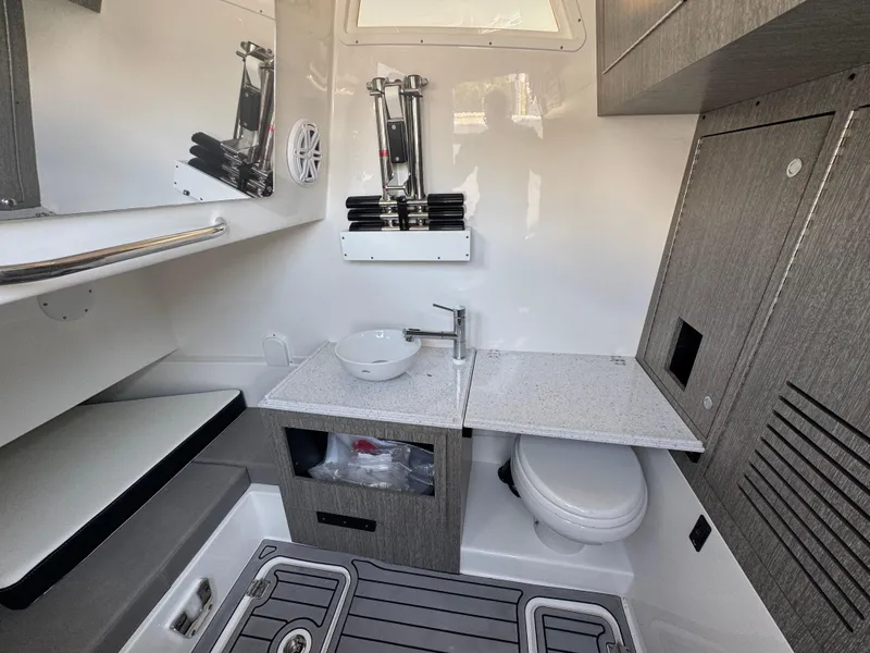 Slide: The Image of 2024 Tidewater 380 CC Adventure boat interior with modern bathroom amenities. - 30