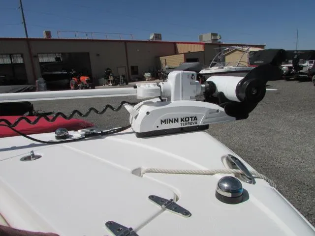 Slide: The Image of Minn Kota Terrova motor on 2021 Sea Hunt 219 Ultra boat, parked outdoors. - 19