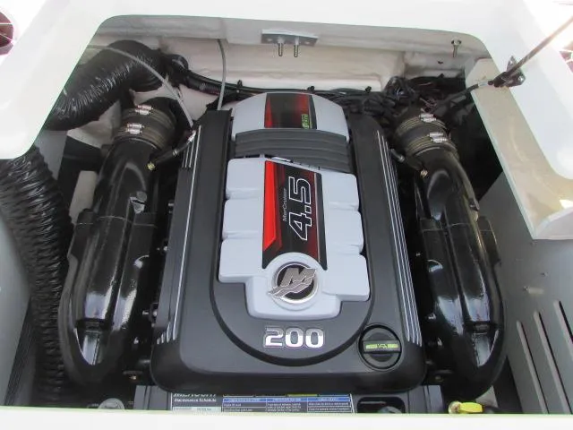 Slide: The Image of 2023 Sea Ray 190 Sport engine, featuring a 4.5L 200 horsepower motor. - 9