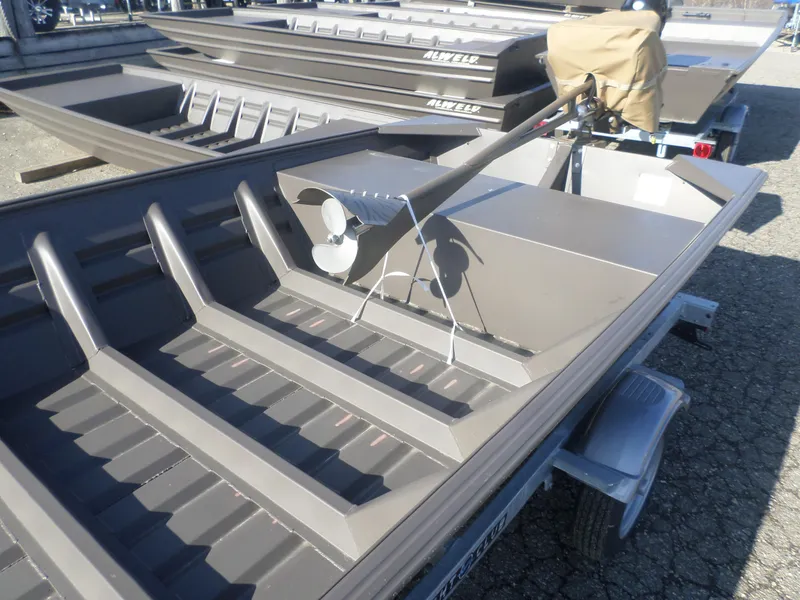 Slide: The Image of 2025 Alweld 1542 Jon boat on trailer, featuring durable aluminum construction. - 10