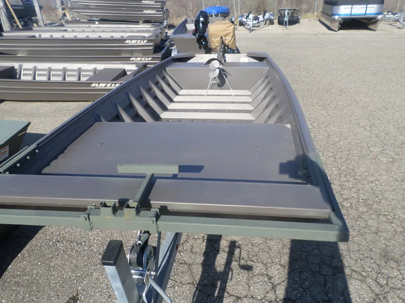 Slide: The Image of 2025 Alweld 1542 Jon boat on trailer in outdoor lot. - 5