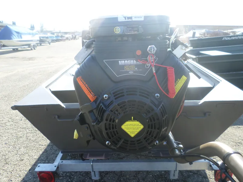 Slide: The Image of 2025 Alweld 1542 Jon boat with Vanguard 23 HP engine on a trailer. - 8