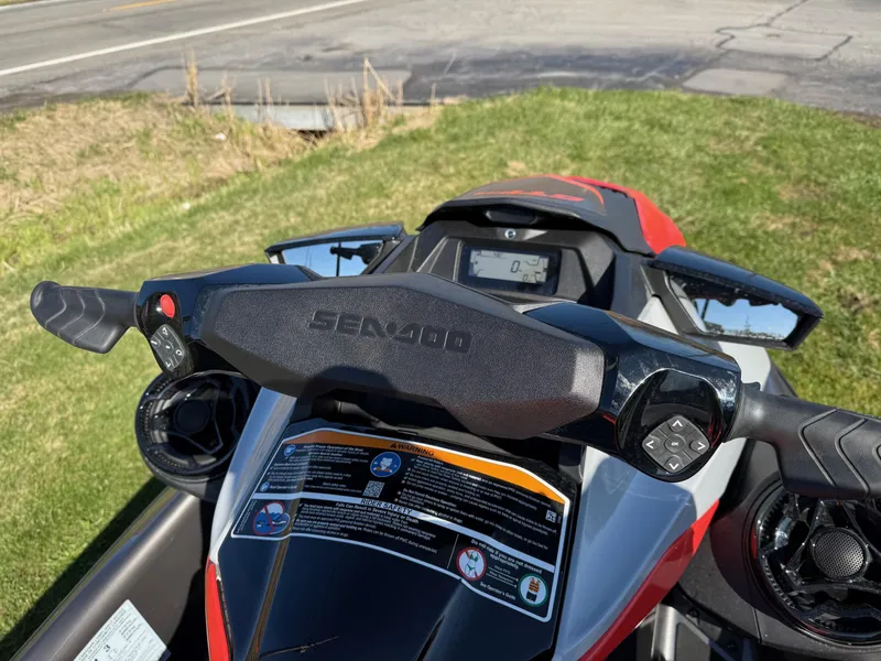 Slide: The Image of 2023 Sea-Doo GTI SE 130 dashboard with BRP Premium Audio and iBR controls. - 5
