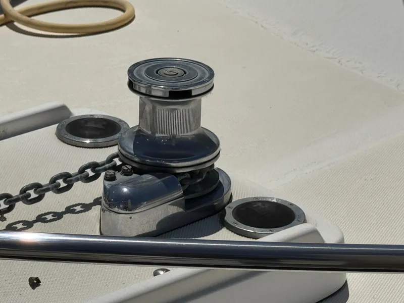Slide: The Image of Anchor winch on 2003 Mediterranean 38 Convertible yacht deck. - 20