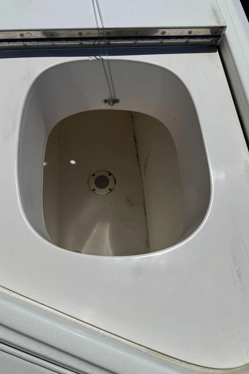 Slide: The Image of Livewell compartment on a 2003 Mediterranean 38 Convertible boat. - 28