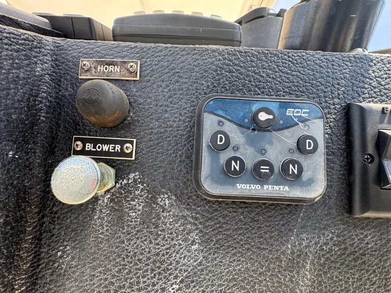 Slide: The Image of Control panel of a 2003 Mediterranean 38 Convertible boat with Volvo Penta controls. - 43