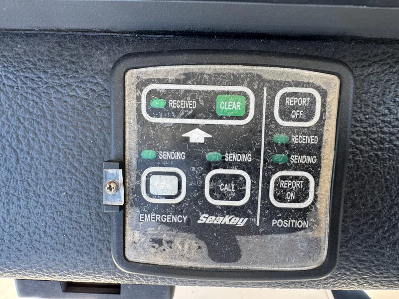 Slide: The Image of Control panel of a 2003 Mediterranean 38 Convertible boat with SeaKey system. - 44