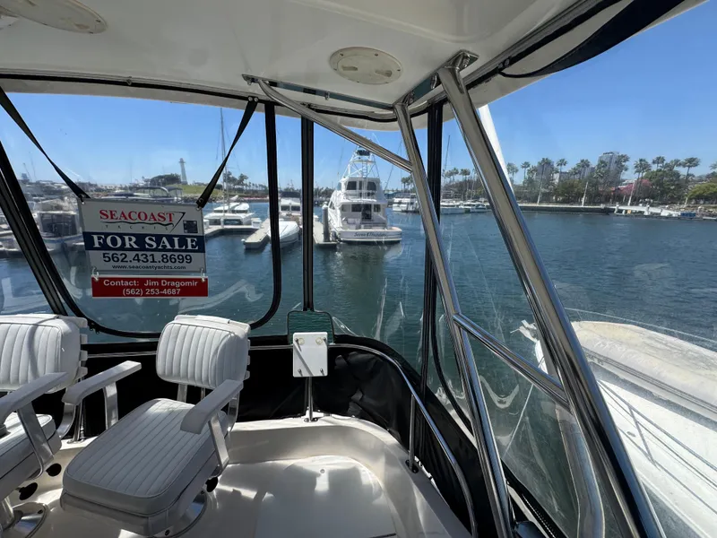 Slide: The Image of 2003 Mediterranean 38 Convertible yacht for sale, docked in marina, interior view. - 49