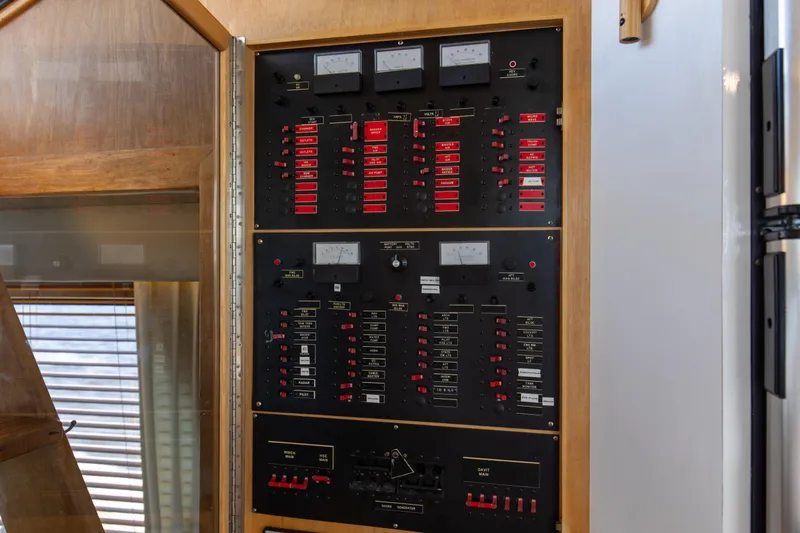 Slide: The Image of Electrical control panel inside 1997 Navigator 5600 Sundance Pilothouse yacht. - 41