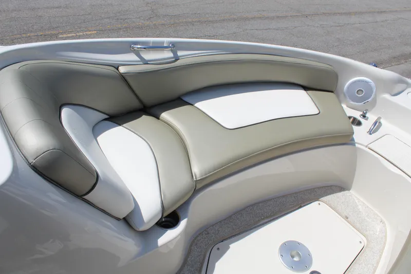 Slide: The Image of Luxurious seating on a 2007 Sea Ray 240 Sundeck boat, featuring comfortable upholstery. - 20