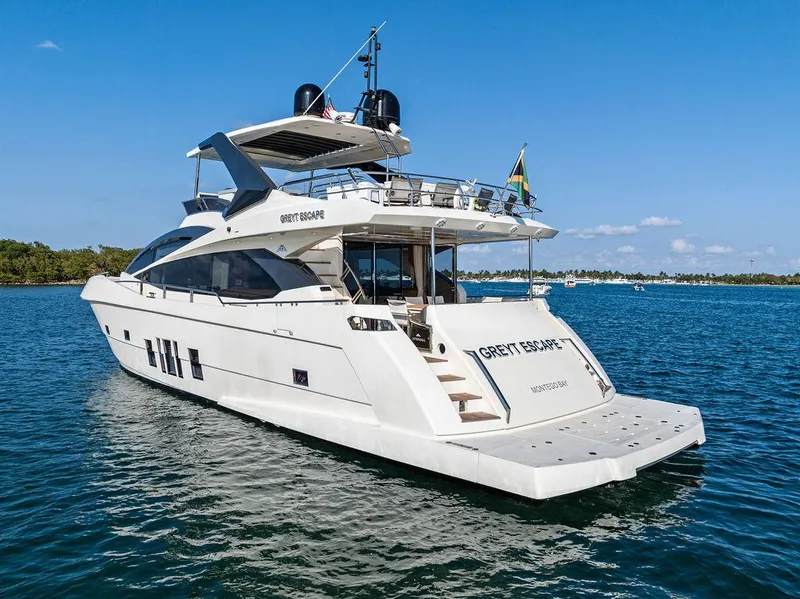 Slide: The Image of Astondoa 72 GLX 2013 yacht cruising on clear blue waters under a sunny sky. - 12