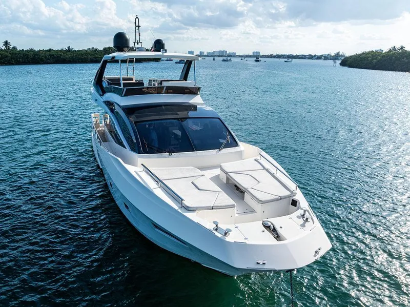 Slide: The Image of Luxurious 2013 Astondoa 72 GLX yacht cruising on serene blue waters. - 16