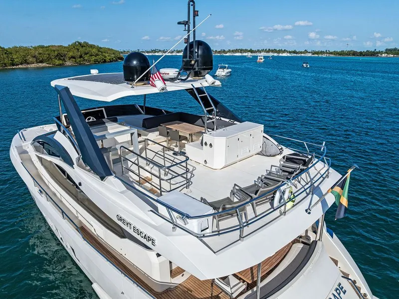 Slide: The Image of Luxurious 2013 Astondoa 72 GLX yacht cruising on clear blue waters. - 22