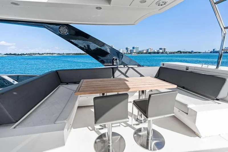 Slide: The Image of Luxurious Astondoa 72 GLX yacht deck with seating, table, and ocean view, 2013 model. - 27
