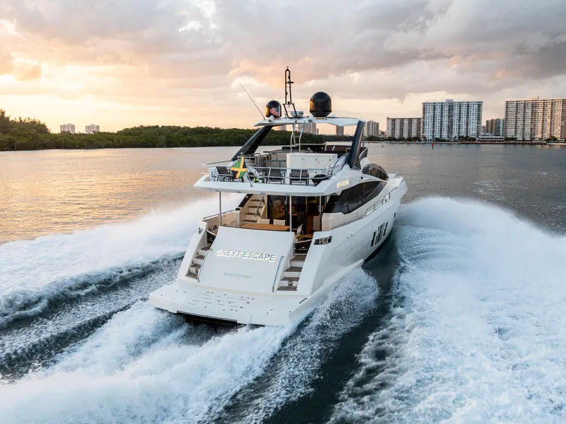 Slide: The Image of Astondoa 72 GLX yacht cruising on water at sunset, 2013 model. - 7