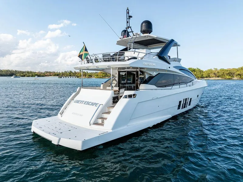 Slide: The Image of Luxury 2013 Astondoa 72 GLX yacht cruising on serene waters. - 9