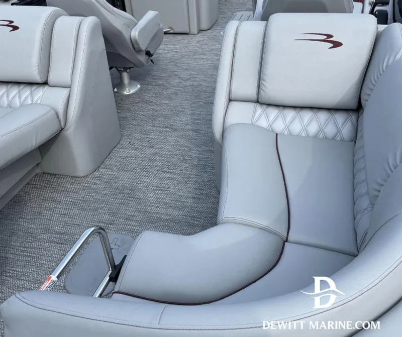 Slide: The Image of Luxurious seating on 2023 Bennington Marine 25RFBST pontoon boat, featuring elegant gray upholstery. - 14