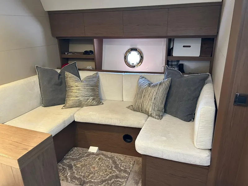 Slide: The Image of Luxurious interior of 2019 Beneteau Gran Turismo 46 yacht with cozy seating and elegant decor. - 24