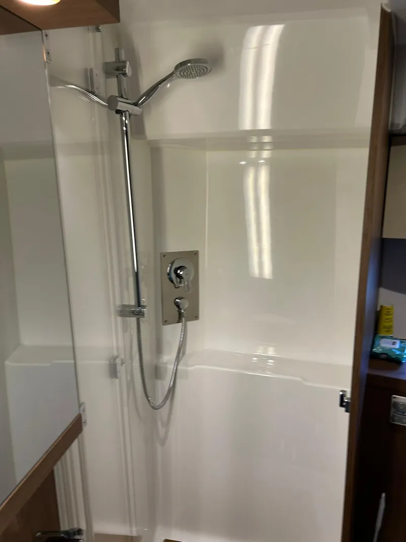 Slide: The Image of Shower area in 2019 Beneteau Gran Turismo 46 yacht, featuring modern fixtures. - 29