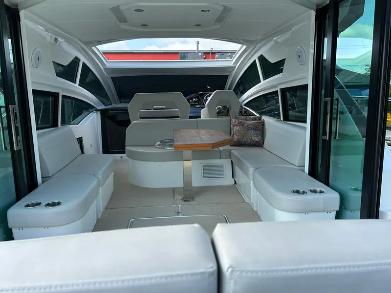 Slide: The Image of 2019 Beneteau Gran Turismo 46 yacht interior with spacious seating and modern design. - 9