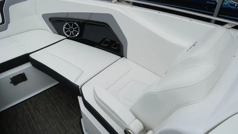 Slide: The Image of Luxurious seating on a 2016 Monterey 328SS boat with integrated speaker system. - 18