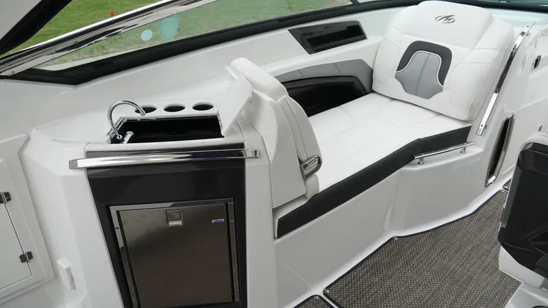 Slide: The Image of Luxurious interior of a 2016 Monterey 328SS boat with seating and kitchenette. - 7