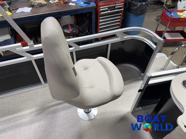 Slide: The Image of 2025 Tahoe Sport 2185 Rear Fish boat seat in workshop setting. - 20